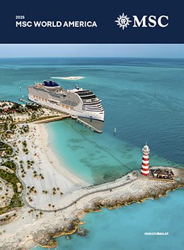 Die MSC World America ankert in einer tropischen Bucht mit einem Leuchtturm im Vordergrund | MSC Cruises Die MSC World America ankert in einer tropischen Bucht mit einem Leuchtturm im Vordergrund | MSC Cruises