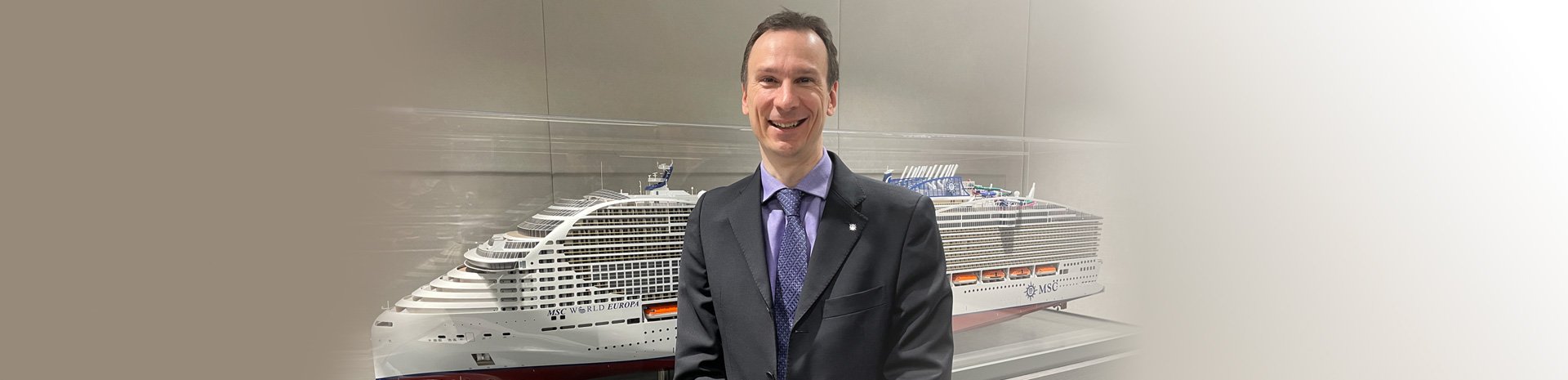 A scale model of an MSC Cruises ship displayed in a modern setting | MSC Cruises A scale model of an MSC Cruises ship displayed in a modern setting | MSC Cruises